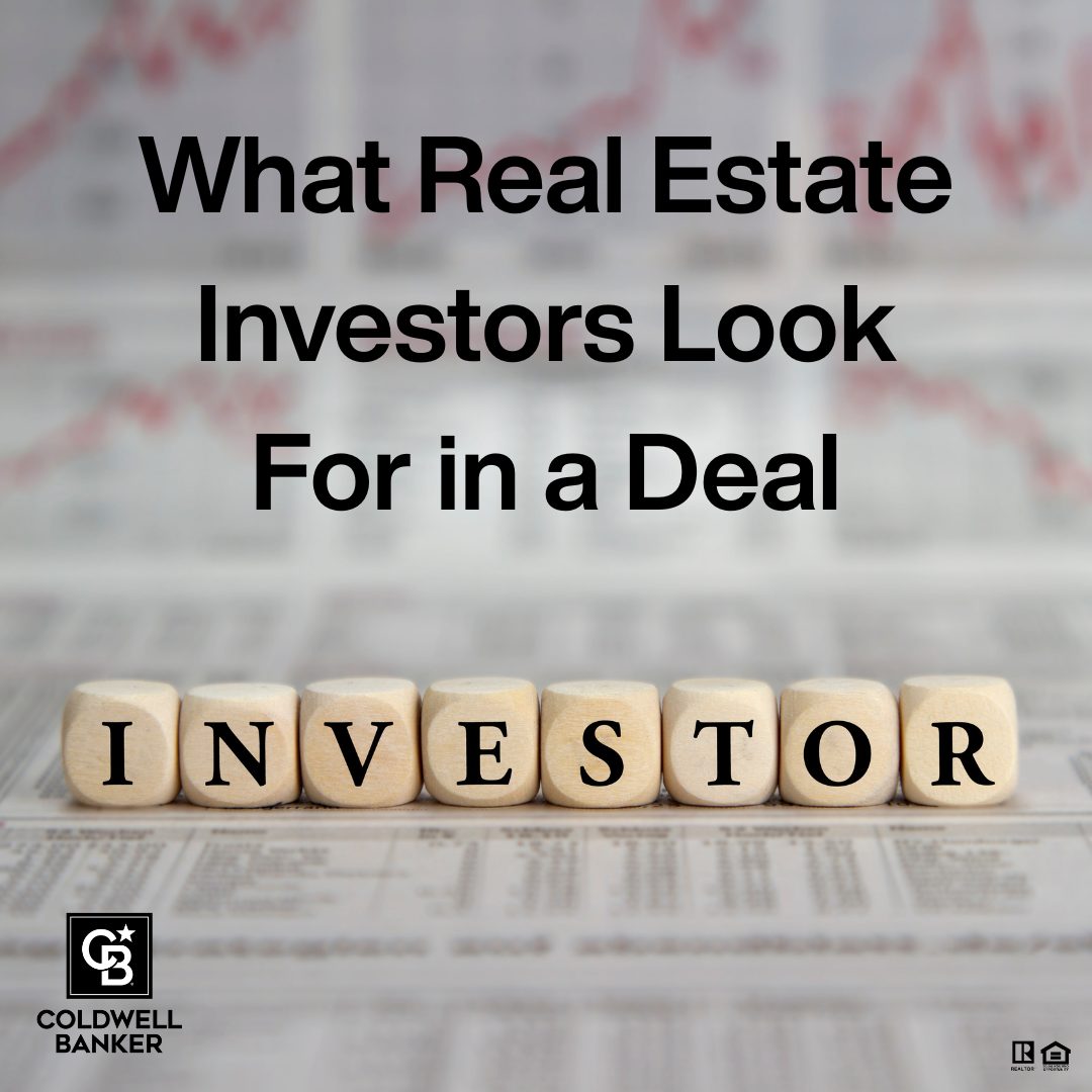 Wooden letter blocks spelling “INVESTOR” sit on a financial newspaper background with the text “What Real Estate Investors Look For in a Deal.” Coldwell Banker Realty and REALTOR® logos are visible at the bottom, representing real estate investment insight.